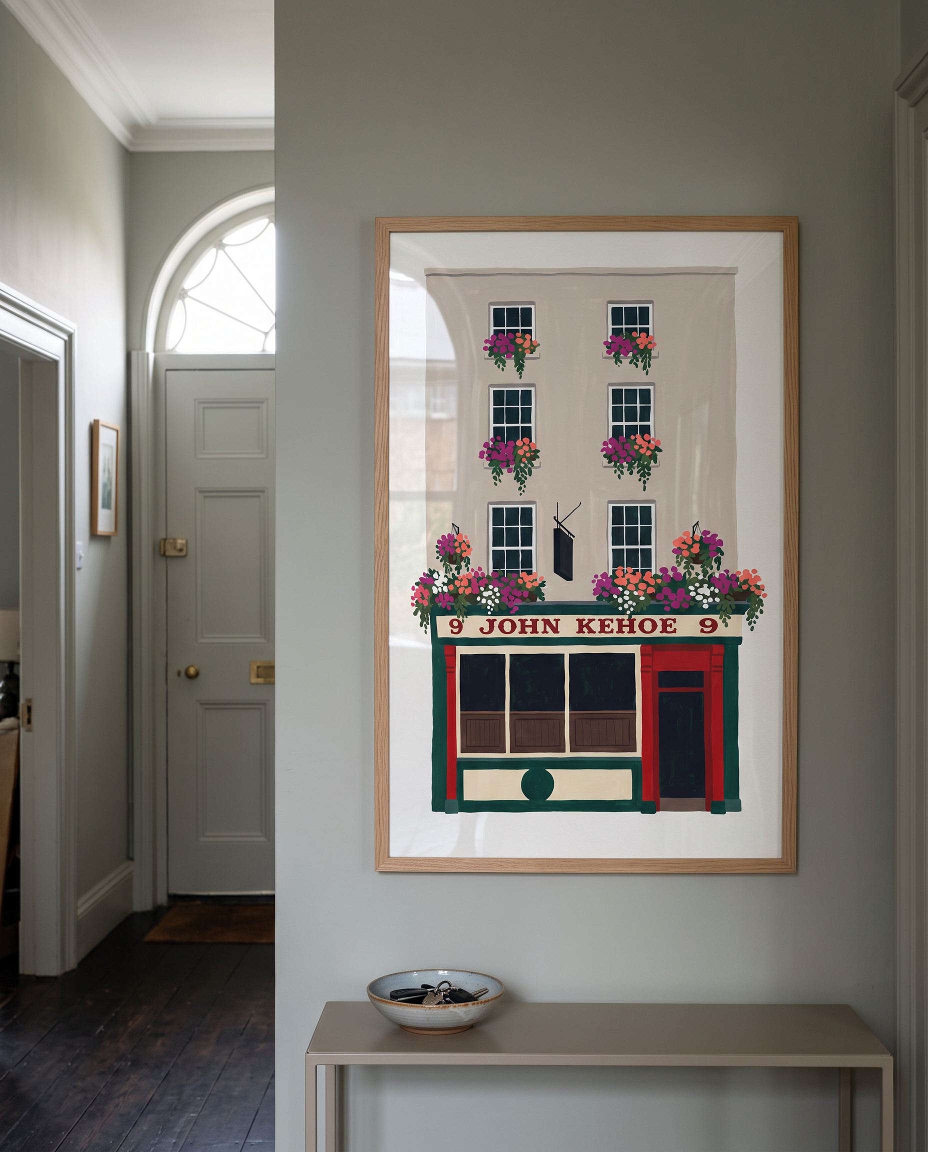 John Kehoe print framed in oak, hanging in a Georgian Dublin hallway